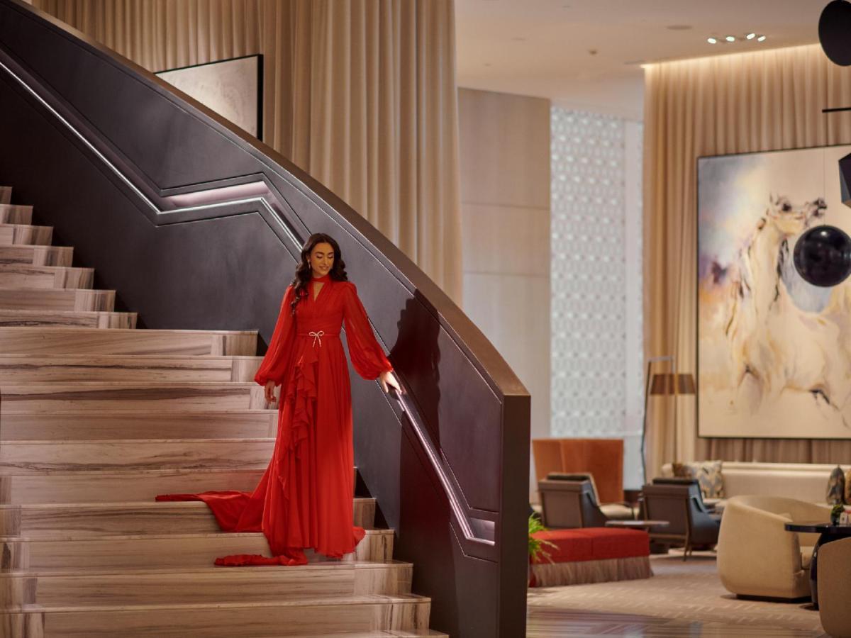 Hotel Grand Hyatt Kuwait Kuwait City Exteriér fotografie A model in a red dress